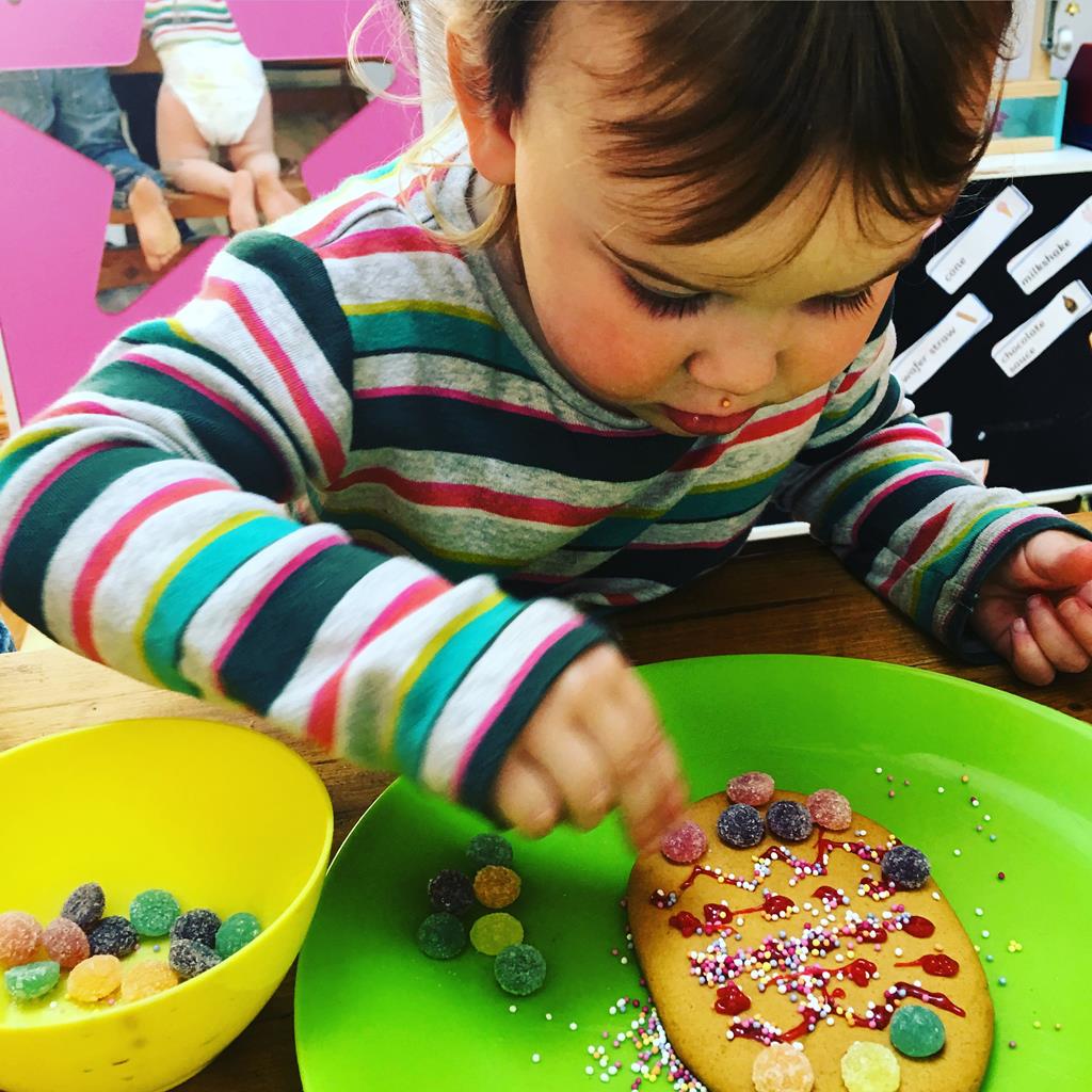 Adding sweets and sprinkles is great for developing fine motor skills 